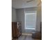 Small bedroom with dresser, window, and ceiling fan at 1336 Diamond Se Ave, Atlanta, GA 30316