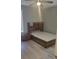 Bright bedroom featuring a modern bed frame and nightstand at 1336 Diamond Se Ave, Atlanta, GA 30316