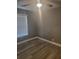 Bright bedroom with ceiling fan and wood-look flooring at 1336 Diamond Se Ave, Atlanta, GA 30316
