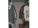 Closet with clothes hanging on racks at 1336 Diamond Se Ave, Atlanta, GA 30316