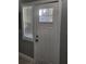 Front entry with white door and side window at 1336 Diamond Se Ave, Atlanta, GA 30316