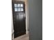 Dark brown front door with a glass pane window at 1336 Diamond Se Ave, Atlanta, GA 30316