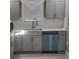 Modern kitchen with gray cabinets and quartz countertops at 1336 Diamond Se Ave, Atlanta, GA 30316