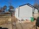Side view of the house, showing the gray siding and a small deck at 1336 Diamond Se Ave, Atlanta, GA 30316