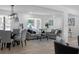 Open concept living area with hardwood floors and dining area at 2233 Troutdale Dr, Decatur, GA 30032