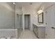 Spa-like bathroom with soaking tub and walk-in shower at 3528 Myron Pl, Suwanee, GA 30024