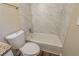 Clean bathroom with bathtub and tile surround at 4424 Malibu Dr, Decatur, GA 30035