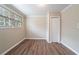 Bright bedroom with wood-look floors and ample closet space at 4424 Malibu Dr, Decatur, GA 30035