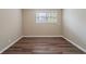 Spacious bedroom with neutral walls and new flooring at 4424 Malibu Dr, Decatur, GA 30035