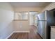 Kitchen with stainless steel refrigerator and view into dining area at 4424 Malibu Dr, Decatur, GA 30035