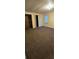 Bedroom with brown carpet and double closets at 710 Seals Rd, Dallas, GA 30157