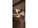 Kitchen with wood cabinets and an island, wood-look floors at 710 Seals Rd, Dallas, GA 30157