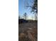 Rustic barn in wooded area at sunset at 710 Seals Rd, Dallas, GA 30157