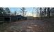 Rustic barn with open sides near the woods at 710 Seals Rd, Dallas, GA 30157