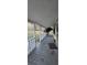 Covered porch with white railings at 710 Seals Rd, Dallas, GA 30157