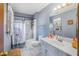 Bathroom featuring a shower and tub and a modern vanity at 1330 Hillcrest Dr, Sugar Hill, GA 30518