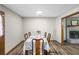 Dining room featuring a long table with seating for eight and wood-look floors at 1330 Hillcrest Dr, Sugar Hill, GA 30518