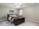 Charming bedroom with ceiling fan and neutral decor at 198 Cypress Dr, Dallas, GA 30157