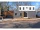 Modern two-story home with gray brick and wood accents at 223 Altoona Sw Pl, Atlanta, GA 30314