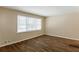 Living room with neutral walls and wood flooring at 3936 Kirksford Dr, Decatur, GA 30035