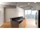Modern kitchen with granite countertops and stainless steel appliances at 400 W Peachtree Nw St # 2303, Atlanta, GA 30308