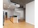 Modern kitchen with granite countertops and stainless steel appliances at 400 W Peachtree Nw St # 2303, Atlanta, GA 30308