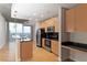 Modern kitchen with granite countertops and stainless steel appliances at 400 W Peachtree Nw St # 2303, Atlanta, GA 30308