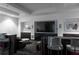 Modern media room boasts a large screen TV, comfortable seating, and stylish decor at 400 W Peachtree Nw St # 2303, Atlanta, GA 30308