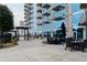 Relaxing outdoor patio area with seating and city views at 400 W Peachtree Nw St # 2303, Atlanta, GA 30308