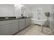 Elegant bathroom with double vanity and clawfoot tub at 860 N Bethany Rd, Mcdonough, GA 30252