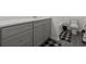 Bathroom with grey vanity and black and white rug at 860 N Bethany Rd, Mcdonough, GA 30252