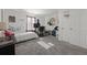 Spacious bedroom with a bed and gaming setup at 860 N Bethany Rd, Mcdonough, GA 30252