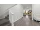 Bright entryway with staircase and hardwood floors at 860 N Bethany Rd, Mcdonough, GA 30252