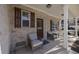Inviting front porch with two wicker chairs at 860 N Bethany Rd, Mcdonough, GA 30252