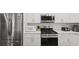 Modern kitchen features stainless steel appliances at 860 N Bethany Rd, Mcdonough, GA 30252