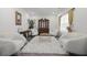 Spacious living room with comfy seating and a large rug at 860 N Bethany Rd, Mcdonough, GA 30252