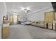Spacious main bedroom with a king-size bed and sitting area at 860 N Bethany Rd, Mcdonough, GA 30252