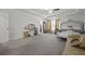 Large main bedroom with a king bed and sitting area at 860 N Bethany Rd, Mcdonough, GA 30252