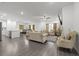 Open concept living and kitchen area with hardwood floors at 860 N Bethany Rd, Mcdonough, GA 30252