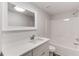 Bathroom featuring a modern vanity and shower-tub combination at 1630 Bettis Tribble Gap Rd, Cumming, GA 30040