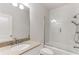 Modern bathroom featuring a glass-enclosed shower and granite vanity at 1630 Bettis Tribble Gap Rd, Cumming, GA 30040