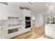 Contemporary kitchen with stainless steel appliances, granite countertops and backsplash at 1630 Bettis Tribble Gap Rd, Cumming, GA 30040
