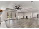 Spacious living room with recessed lighting and a kitchenette at 1630 Bettis Tribble Gap Rd, Cumming, GA 30040
