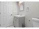 Charming bathroom featuring a new vanity, decorative mirror, and tiled floors at 2183 Pansy Nw St, Atlanta, GA 30314