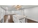 Open living space with hardwood flooring and a kitchen island, great for entertaining at 2183 Pansy Nw St, Atlanta, GA 30314