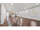 Open floor plan living room boasts hardwood flooring and easy access to kitchen at 2183 Pansy Nw St, Atlanta, GA 30314