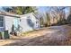 The backyard features light blue siding and a quaint back entrance, ideal for outdoor access at 2183 Pansy Nw St, Atlanta, GA 30314