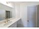 Vanity with white quartz countertop and gold fixtures at 5470 Crow Dr, Cumming, GA 30041
