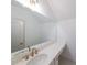 Double vanity with quartz countertop and gold fixtures at 5470 Crow Dr, Cumming, GA 30041