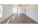 Bright and airy bedroom with hardwood floors and access to other rooms at 5470 Crow Dr, Cumming, GA 30041